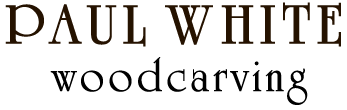 paul white woodcarving title text